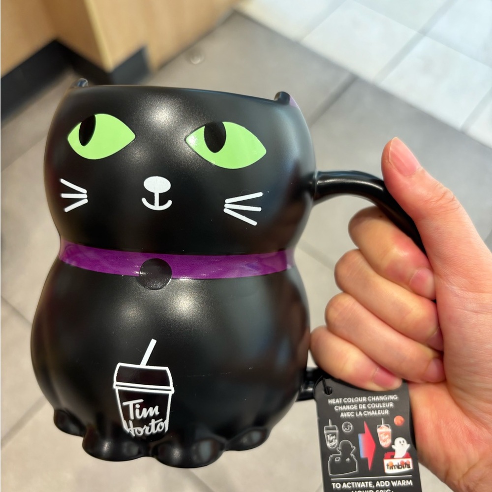 Black Cat Mug with Green Eyes and Purple Collar - Heat Activated